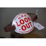 RAILWAYANA - A VINTAGE RED AND WHITE ENAMEL N.B.R (NORTH BRITISH RAILWAYS) 'LOOKOUT' ARMBAND ON