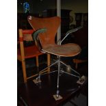 A MID CENTURY FRITZ HANSEN PLYWOOD AND METAL SWIVEL OFFICE CHAIR, CIRCA 1960's, DESIGNED BY ARNE