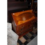 A 20TH CENTURY MAHOGANY DROP FRONT BUREAU, THE DROP TOP REVEALING BROWN LEATHERETTE MOUNTED SKIVER