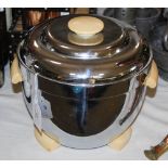 AN ART DECO STYLE THERMOS ICE BUCKET, MODEL NO. 925, OF CIRCULAR FORM WITH IVORINE FEET AND HANDLES,