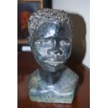 A GREEN STONE BUST OF A YOUNG BOY BY NICHOLAS TANDI (SHONA TRIBE OF SOUTHERN AFRICA B.1949),