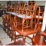 A LATE 19TH / EARLY 20TH CENTURY MAHOGANY EXTENDING DINING TABLE WITH THREE ADDITIONAL LEAVES,