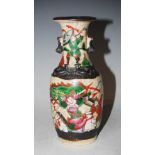 A CHINESE PORCELAIN FAMILLE ROSE CRACKLE GLAZED WARRIOR VASE