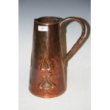 AN ART NOUVEAU COPPER JUG WITH EMBOSSED DECORATION OF STYLISED FLOWERS