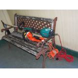 CAST IRON AND WOODEN GARDEN BENCH, THE BACK RAIL WITH MOUNTED CAST IRON LATTICE PANEL, 126CM LONG.