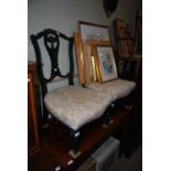 PAIR OF EDWARDIAN EBONISED NURSING CHAIRS WITH FOLIATE UPHOLSTERED SEATS, TOGETHER WITH A MAHOGANY