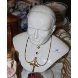 WHITE GLAZED CERAMIC PORTRAIT BUST OF POPE JOHN PAUL II WITH GILT DETAILING, 30CM HIGH.