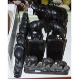GROUP OF 20TH CENTURY INDIAN CARVED EBONY AND BONE ELEPHANT FIGURES, INCLUDING A PAIR OF BOOKENDS,