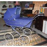 A VINTAGE MARMET NAVY CANVAS AND STAINLESS STEEL FRAMED PRAM, 92CM LONG