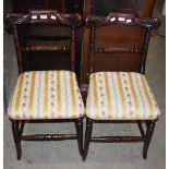 A PAIR OF 19TH CENTURY CARVED STAINED OAK SALON CHAIRS, EACH WITH CARVED BACK RAIL AND SUPPORTS WITH