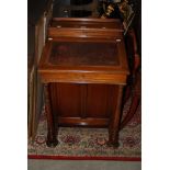 A LATE 19TH / EARLY 20TH CENTURY MAHOGANY DAVENPORT, THE HINGED LIDDED GALLERY TOP REVEALING A