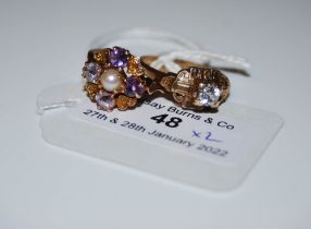 A 9CT GOLD AMETHYST AND SPLIT PEARL CLUSTER RING TOGETHER WITH A YELLOW METAL PASTE SET SOLITAIRE