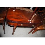 A 19TH CENTURY MAHOGANY AND EBONY LINED TURNOVER TEA TABLE WITH SINGLE FRIEZE DRAWER ON TAPERED