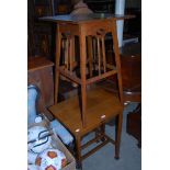 TWO EARLY 20TH CENTURY OAK OCCASIONAL TABLES, THE FIRST OF SQUARE FORM, THE TOP INLAID WITH