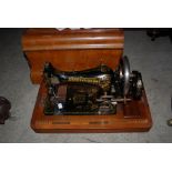 VINTAGE 'FRISTER AND ROSSMANN' SEWING MACHINE IN PARQUETRY INLAID CASE.