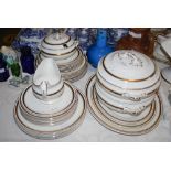 AN EARLY 20TH CENTURY BURLEIGH WARE GILT PART DINNER SERVICE INCLUDING TUREENS, ASHETS, A SAUCE