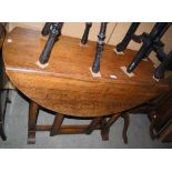 EARLY 20TH CENTURY OAK ARTS AND CRAFTS STYLE DROP-LEAF DINING TABLE ON FOUR OCTAGONAL SUPPORTS.