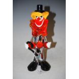 A VINTAGE CLEAR AND COLOURED GLASS FIGURE OF A CLOWN IN THE MANNER OF MURANO