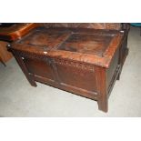 AN 18TH CENTURY AND LATER OAK PANELLED COFFER, THE TWIN PANELLED LID 18TH CENTURY, THE BODY POSSIBLY