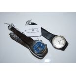 TWO VINTAGE GENTS WRISTWATCHES, COMPRISING A WHITE METAL CASED MEMOSTAR ALARM, MID-CENTURY STYLED
