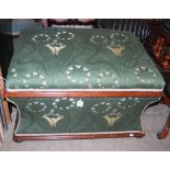A 20TH CENTURY UPHOLSTERED MAHOGANY OTTOMAN OF SARCOPHAGUS FORM WITH CONCAVE TAPERING SIDES, THE TOP