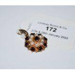 YELLOW METAL SPLIT PEARL AND GARNET CLUSTER PENDANT STAMPED 9CT