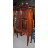 LATE 19TH/ EARLY 20TH CENTURY MAHOGANY GLAZED DISPLAY CABINET ON STAND WITH BROKEN DENTINE