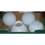 TWO BOXES OF ASSORTED CLEAR AND OPAQUE GLASS LAMP SHADES.