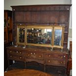19TH CENTURY OAK DRESSER, THE UPRIGHT BACK WITH THREE OPEN PLATE RACKS ON A BASE FITTED WITH FIVE
