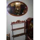 EARLY 20TH CENTURY MAHOGANY OVAL MIRROR INLAID WITH CROSS-BANDED STRINGING, TOGETHER WITH A THREE-
