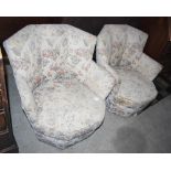 A PAIR OF EARLY 20TH CENTURY UPHOLSTERED TUB ARMCHAIRS, WITH SCALLOPED BACKS AND OCTAGONAL BASES,