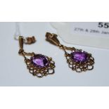 PAIR OF 9CT GOLD AND AMETHYST DROP EARRINGS.