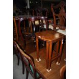 EARLY 20TH CENTURY MAHOGANY TRIANGULAR-SHAPED OCCASIONAL TABLE TOGETHER WITH A NEST OF TWO WALNUT