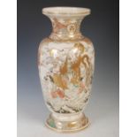 A large Japanese Late Meiji / Taisho period Satsuma vase, of baluster form, the neck and foot with