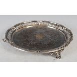 A Victorian silver salver, maker Henry Wilkinson & Co, London 1868, of lobed round form, with