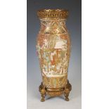 An early 20th century gilt metal mounted Japanese Satsuma vase, of baluster form with figural