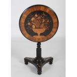 A fine 19th century marquetry inlaid ebonized snap top occasional /apprentice table, the round top