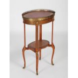 A late 19th / early 20th century French marquetry satinwood occasional table, the pierced gilt metal