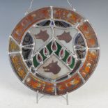 Three Victorian Heraldic lead and stained glass panels, probably Scottish, all of circular form,