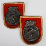 Two unusual Edwardian silver Military badges, London, 1903, makers mark of G.L.Connell, embossed