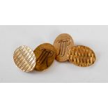 A pair of 9ct gold oval shaped cufflinks, with engine turned and engraved initial detail, gross