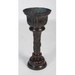 A 20th century Chinese bronze jardiniere stand