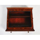 An 18th century Dutch marquetry inlaid small wall cabinet, of square form with two internal