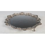 An Edwardian silver salver, maker Henry Stratford Ltd, London 1906, with moulded rim with c-scroll