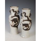 A pair of late 19th / early 20th century Chinese crackle glazed porcelain dragon vases, the vases of