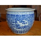 A Chinese porcelain blue and white jardiniere, Qing Dynasty, decorated with rectangular shaped