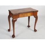 A George III mahogany folding card table, probably Irish, the top of rectangular inverted breakfront