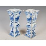 A pair of Chinese blue and white porcelain Gu vases, Transitional Period, with an ovoid middle