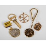 A collection of gold, to include; a 9ct gold key ring, 16.7 grams, a 9ct gold key inscribed JOHN,