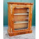 A 19th century walnut and burr walnut veneer inlaid pier cabinet with gilt bronze mounts, the